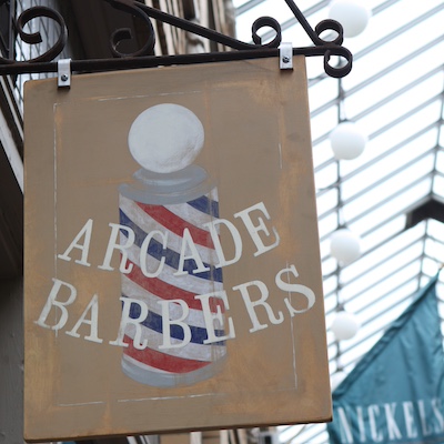 Arcade Barbers Sign